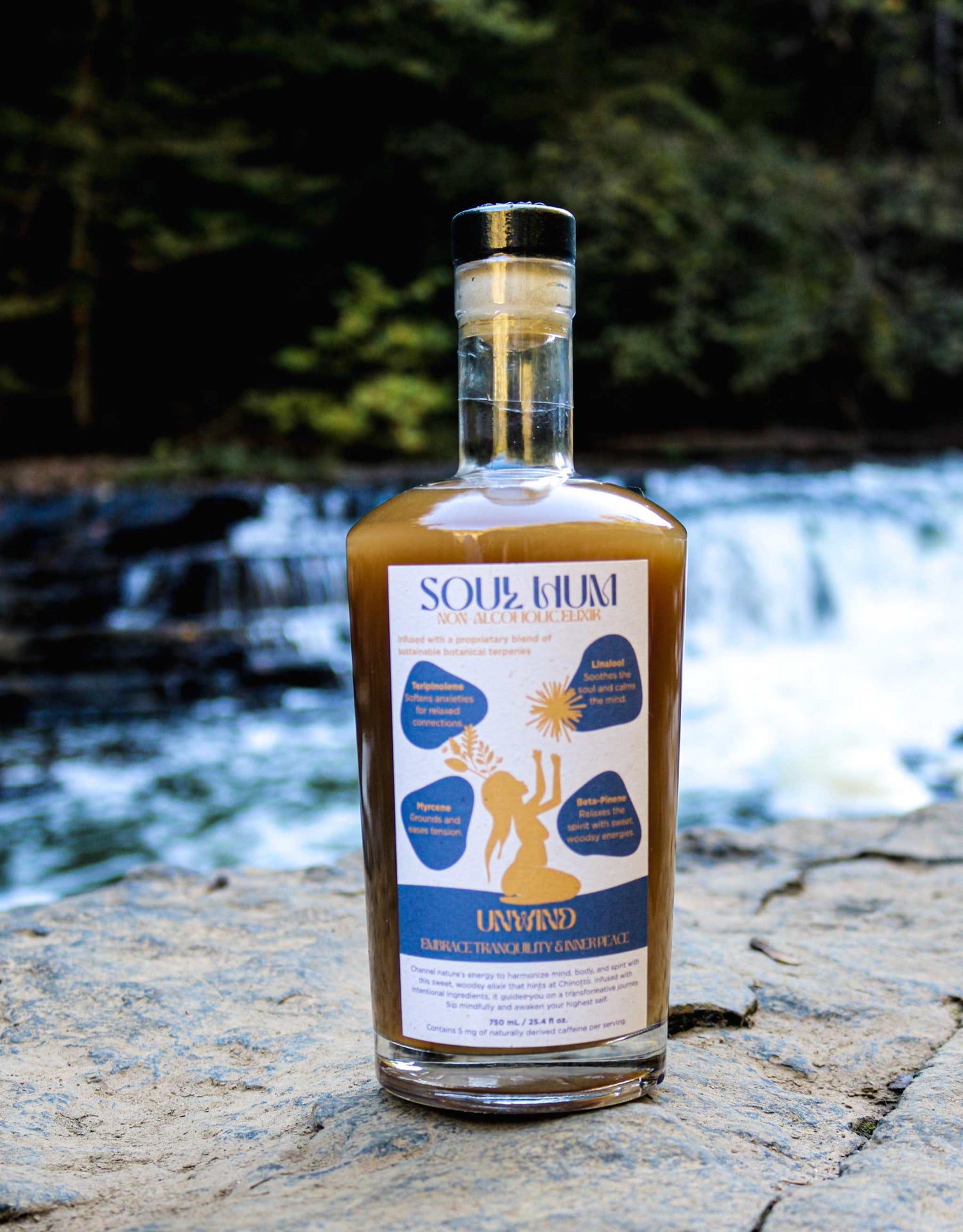 Bottle of Unwind Elixir non-alcoholic calming beverage with citrus and botanical ingredients