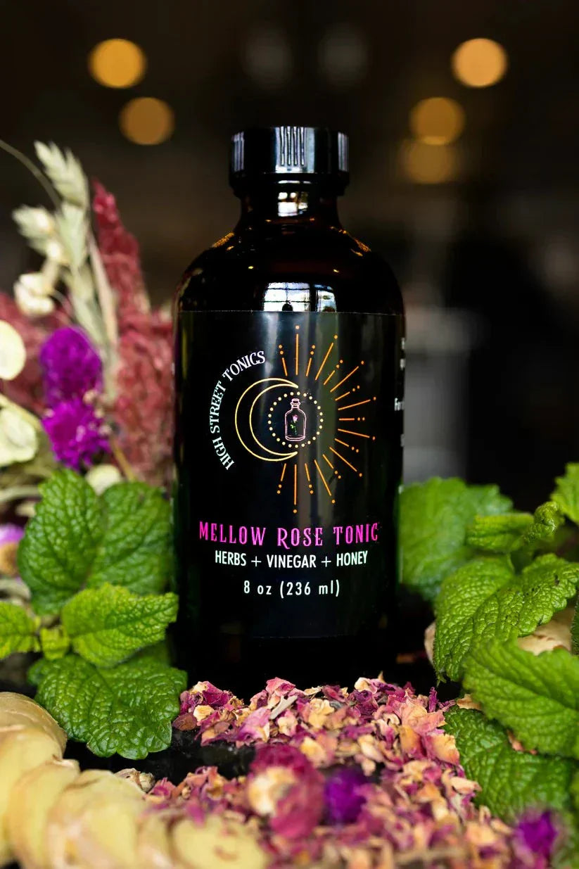 Mellow Rose Tonic bottle with herbal blend for relaxation and inner sunshine.