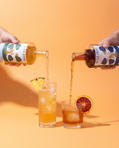 Unwind Elixir being poured over ice