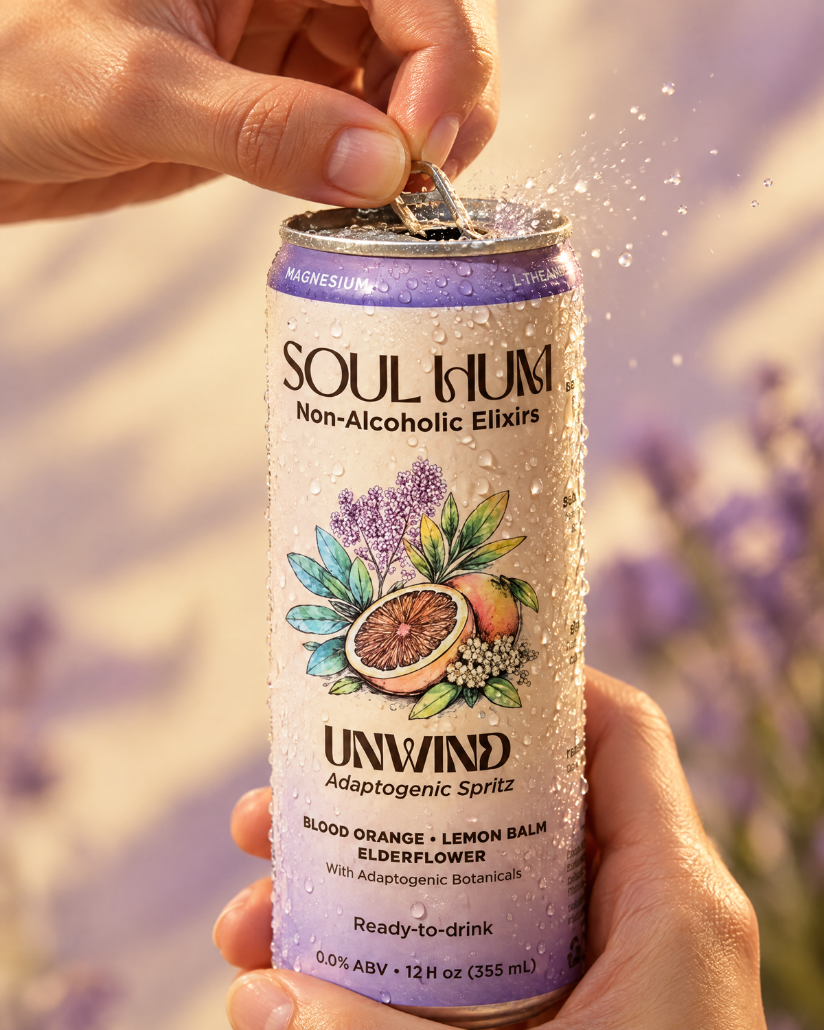 Hand cracking open an Unwind Adaptogenic Spritz can